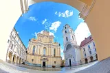 A stunning building featuring a courtyard with elegant arches