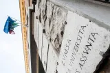 The Italian flag displayed on a building wall